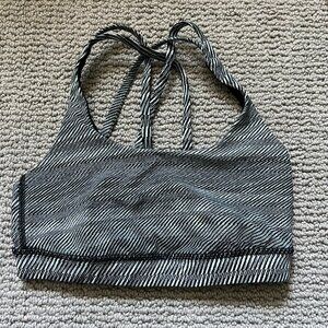 Black and white striped Lulu sports bra